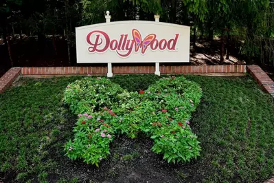 A beautiful floral display in front of the Dollywood sign.