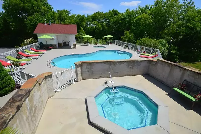 The swimming pool, kiddie pool, and hot tub at Appleview River Resort in the Smoky Mountains.