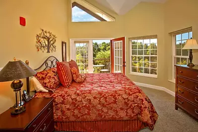 The lovely bedroom in a condo rental from Appleview River Resort near Pigeon Forge TN.