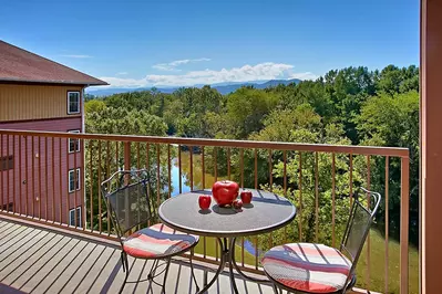 Apples on a table overlooking the Little Pigeon River and the Great Smoky Mountains of Tennessee.